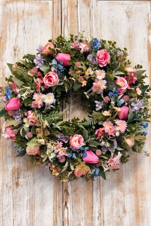 Daisy Wreath featuring Tulips, Roses, Daisys, Forget-me-not, Ranunculus, Mixed foliages including ferns and Eucalyptus.
