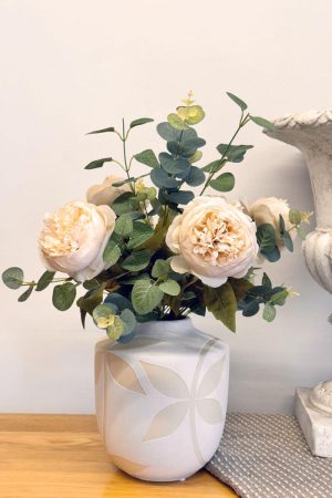 Peony Vase with 5x Cream peonies with eucalyptus foliage, presented in a detailed cream embossed leaf vase.
